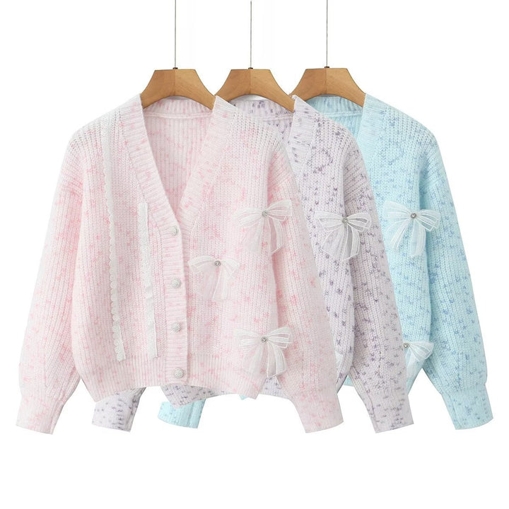 Women's knitted jacket with decorative knots and a delicate pattern Lune London