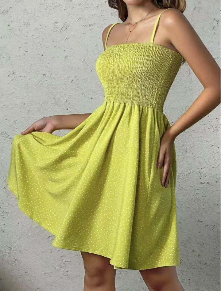 Halter neck dress for women with an airy silhouette and a lovely polka dot pattern Lune London