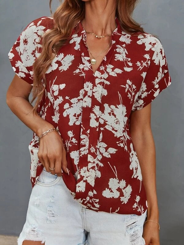 Casual blouse for women with floral pattern and short button placket Lune London