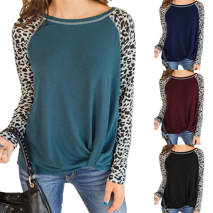 Loose blouse with long sleeves for women with leopard sleeves and bow detail Lune London