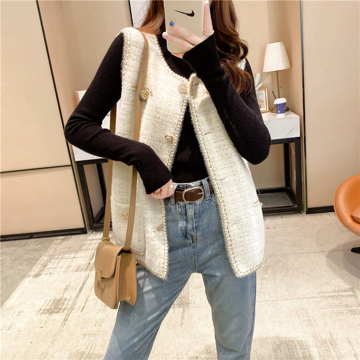 Gilet pour femmes avec des boutons élégants et un design texturé Chic & Stil