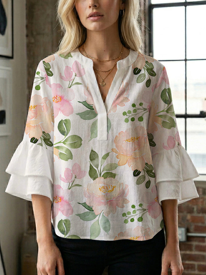Ladies elegant blouse shirt with voluminous puff sleeves and graphic floral design Lune London