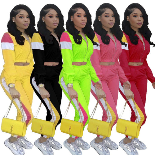 Ensemble de sport pour dames avec col montant à la mode et poignets élastiques
