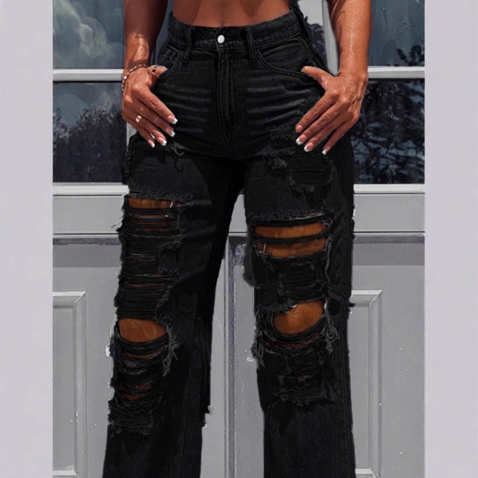 Ladies high-waisted destroyed jeans with wide legs and large knee rips Amarae
