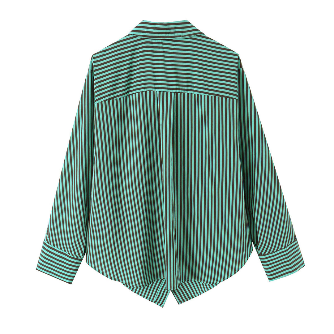 Women's oversized shirt blouse with diagonal stripe pattern, breast pocket, and asymmetrical hem.