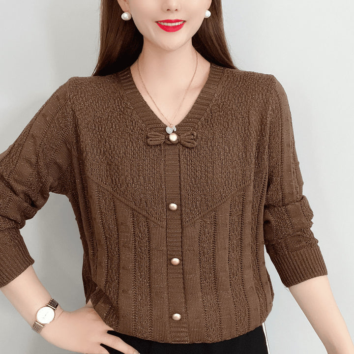 Women knit top with decorative pearl buttons and a refined bow design Lune London