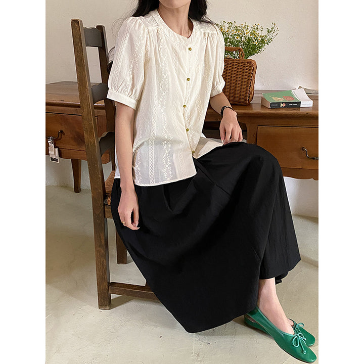 Women's playfully designed blouse with button details Chic & Stil