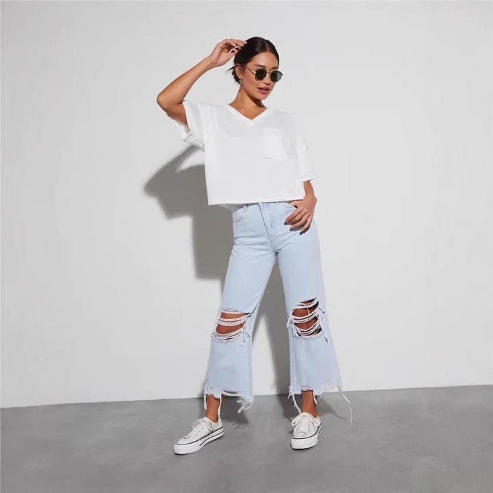 Destroyed jeans for women with a loose fit and bold rips Chic & Stil
