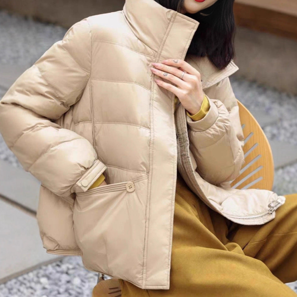 Women's short jacket quilted thermo puffer jacket with high stand-up collar and decorative button details Amarae