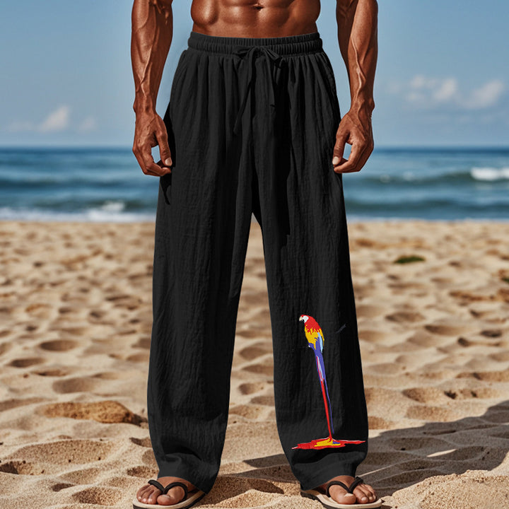 Light beach pants for men with colorful parrot design Lune London