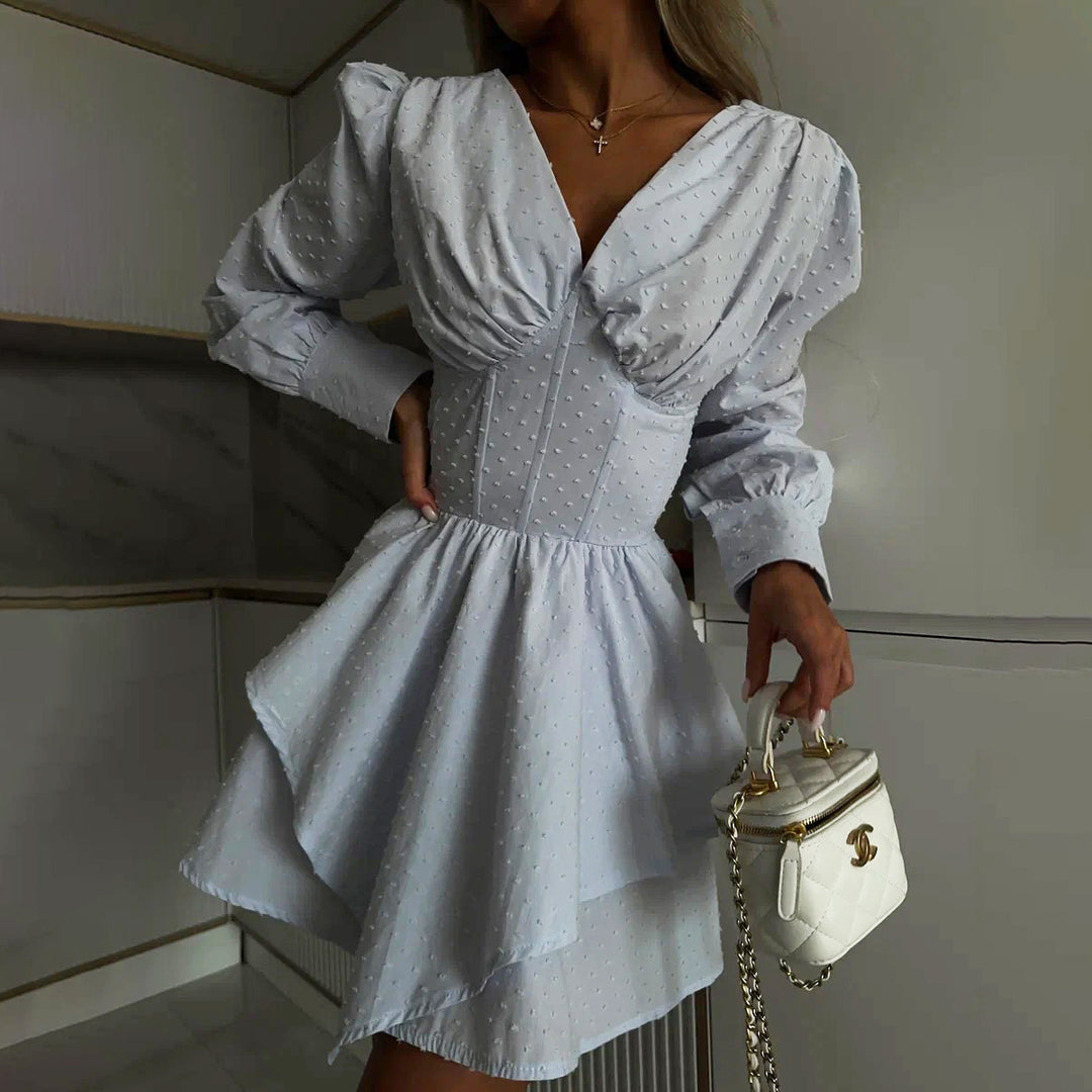 Playful wrap dress for women with voluminous sleeves and an asymmetrical hem Lune London