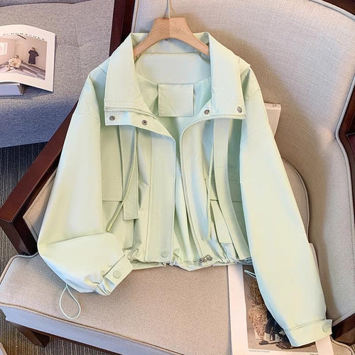 Veste de transition légère pour femmes avec ceinture ajustable et poches pratiques Chic & Stil