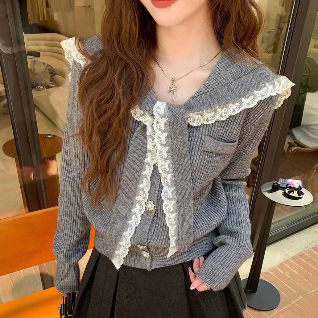 Knitted jacket for women with ruffled collar and decorative buttons Lune London
