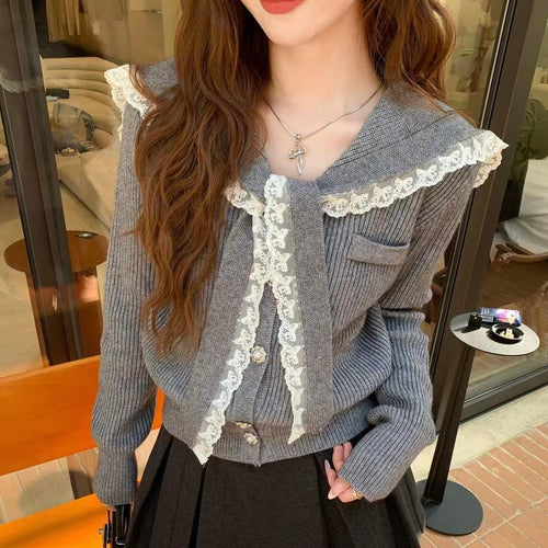 Knitted jacket for women with ruffled collar and decorative buttons Amarae