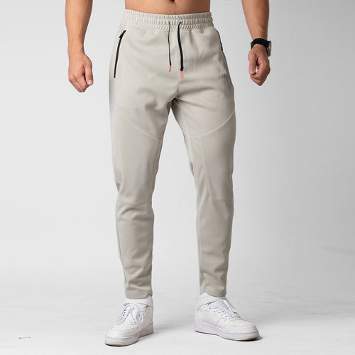 Men's sporty jogging pants with an innovative breathable structure and practical zippered pockets Amarae