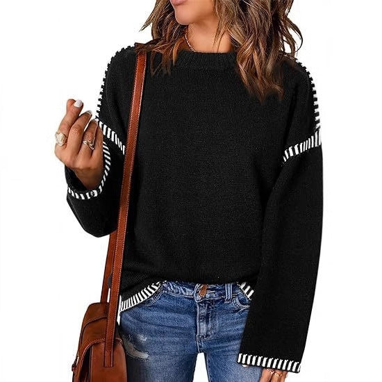 Fashionable women's sweater with structured material and stripe-shaped details Lune London