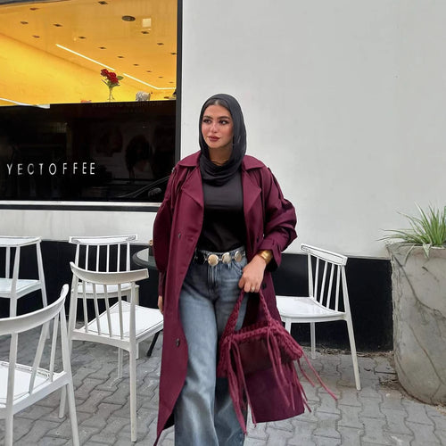 Trendy trench coat for women with an elegant cut and practical pockets Amarae