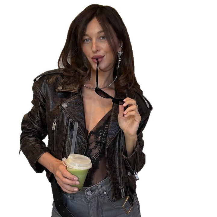 Women short cut biker jacket made of textured faux leather with waist belt Amarae