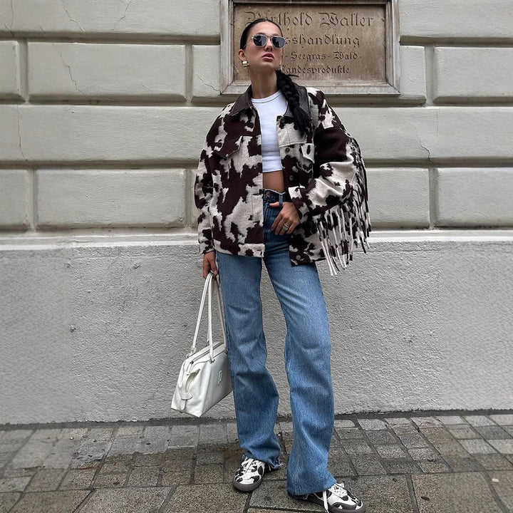 Ladies short jacket in cow print with fringes, faux fur look and leather collar Amarae
