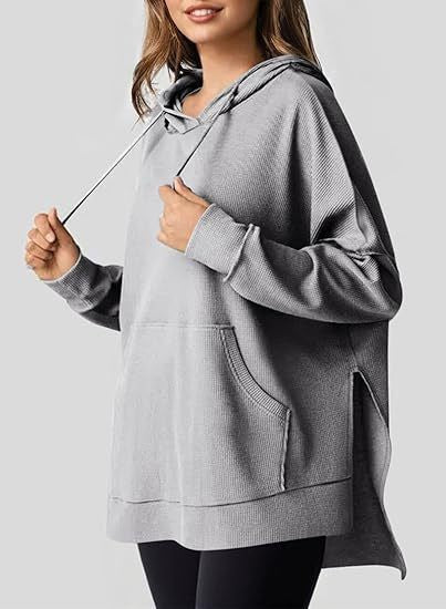 Casual hoodie for women with side slits and practical pockets Lune London