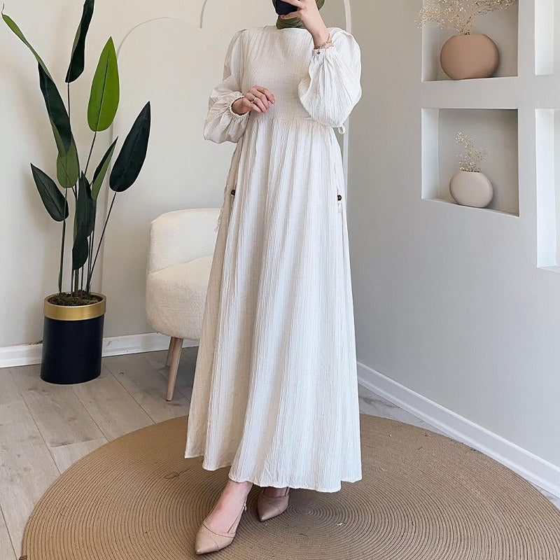 Maxi dress for women with textured design and puff sleeves Lune London