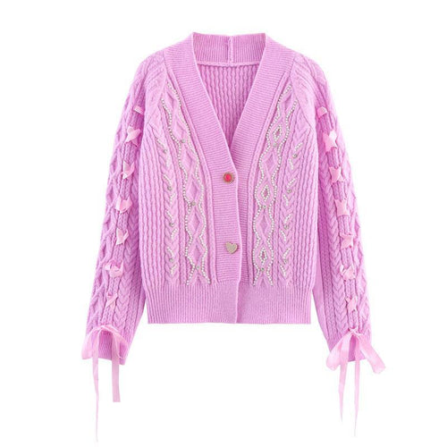 Knitted jacket for women with a detailed textured pattern and elegant ruffle details Amarae