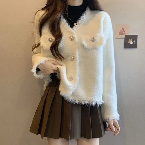 Veste en polaire ludique pour femme avec détails en boutons et franges décoratives Chic & Stil