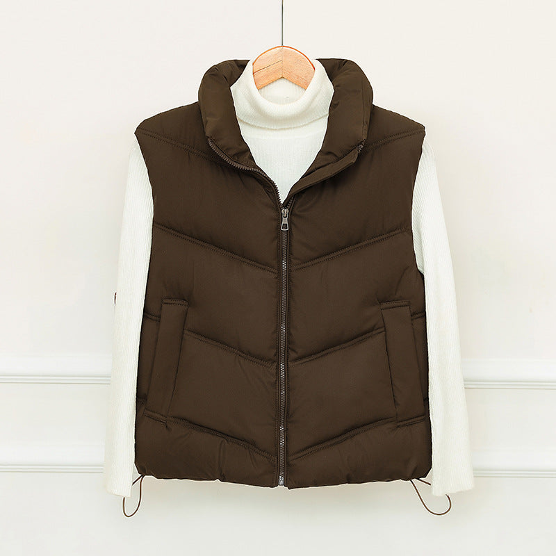 Ladies padded gilet with high collar and practical front pockets Amarae