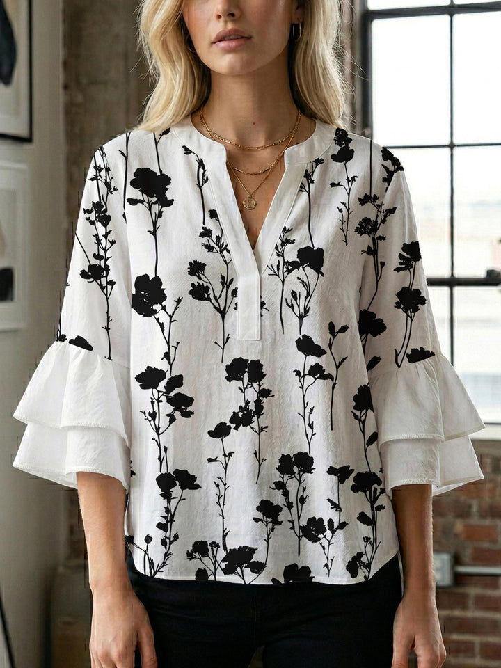 Women's casual blouse with ruffled sleeves and botanical print Lune London
