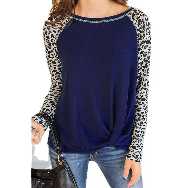 Loose blouse with long sleeves for women with leopard sleeves and bow detail Lune London