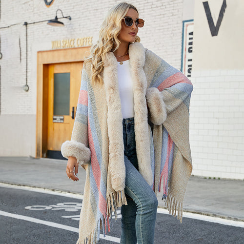 Women fashionable poncho with luxurious faux fur collar and fringes Amarae