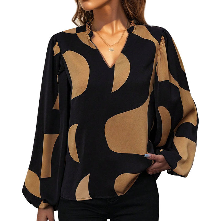 Trendy women's blouse with geometric print and voluminous sleeves Lune London