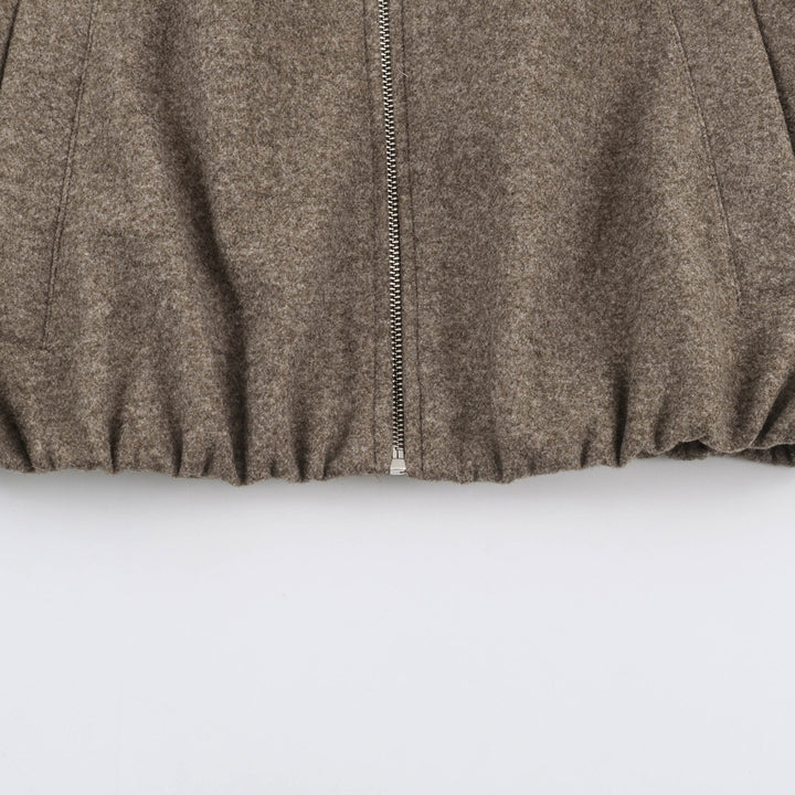 Women’s short jacket with balloon sleeves, wide shirt collar, and elastic hem Amarae