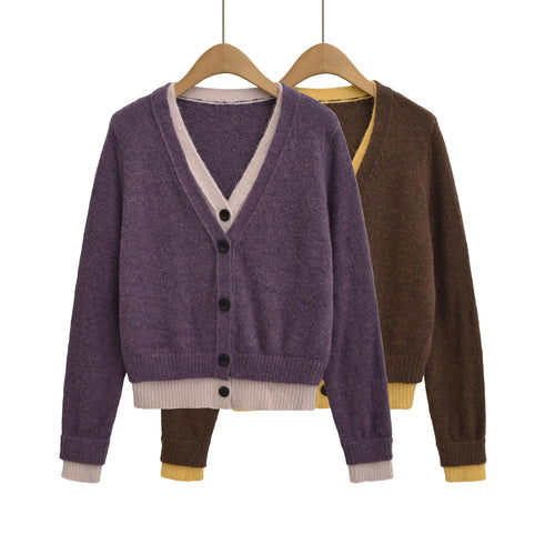 Elegant sweater for women with a deep V-neck and decorative buttons Amarae