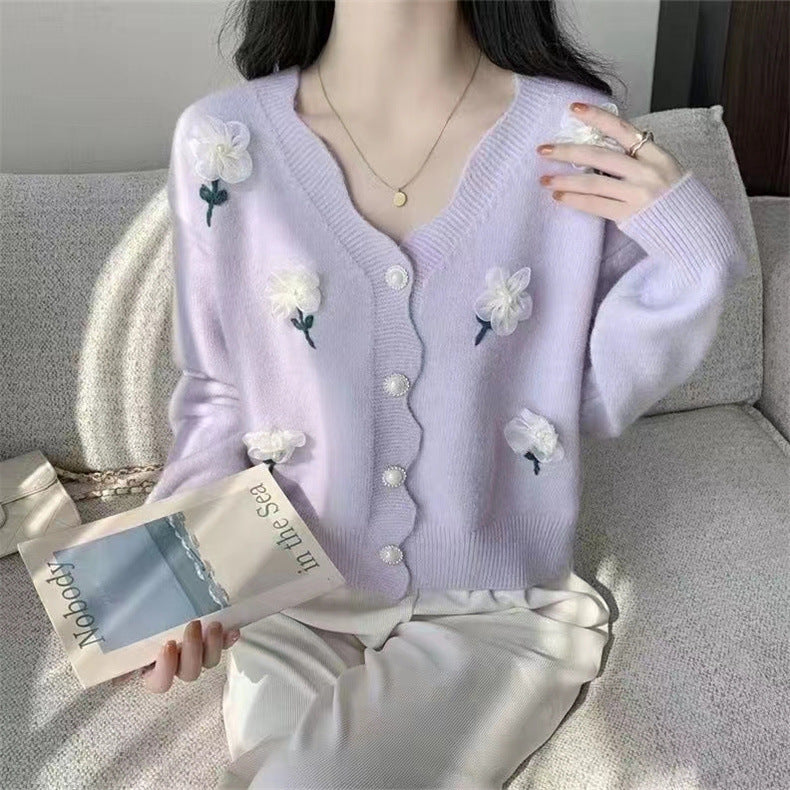 Sweater jacket for women with a floral design and elegant pearl buttons Lune London