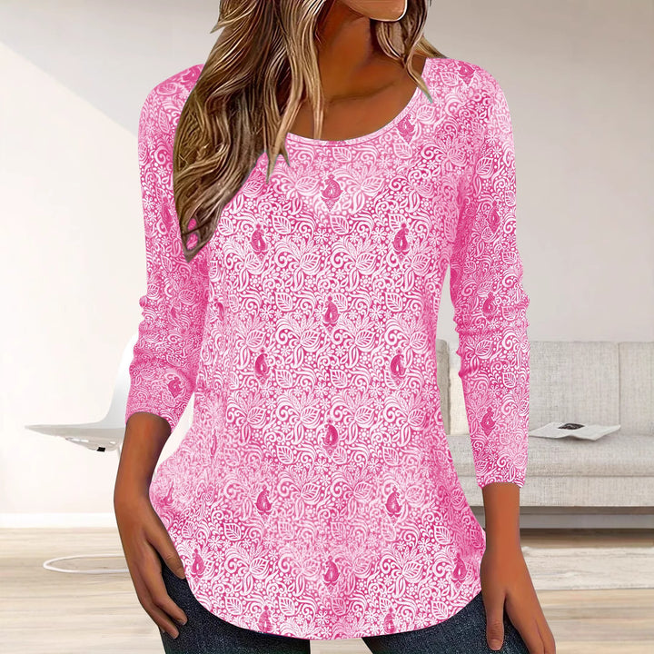 Simple long sleeve women's blouse with floral design and round neckline Lune London