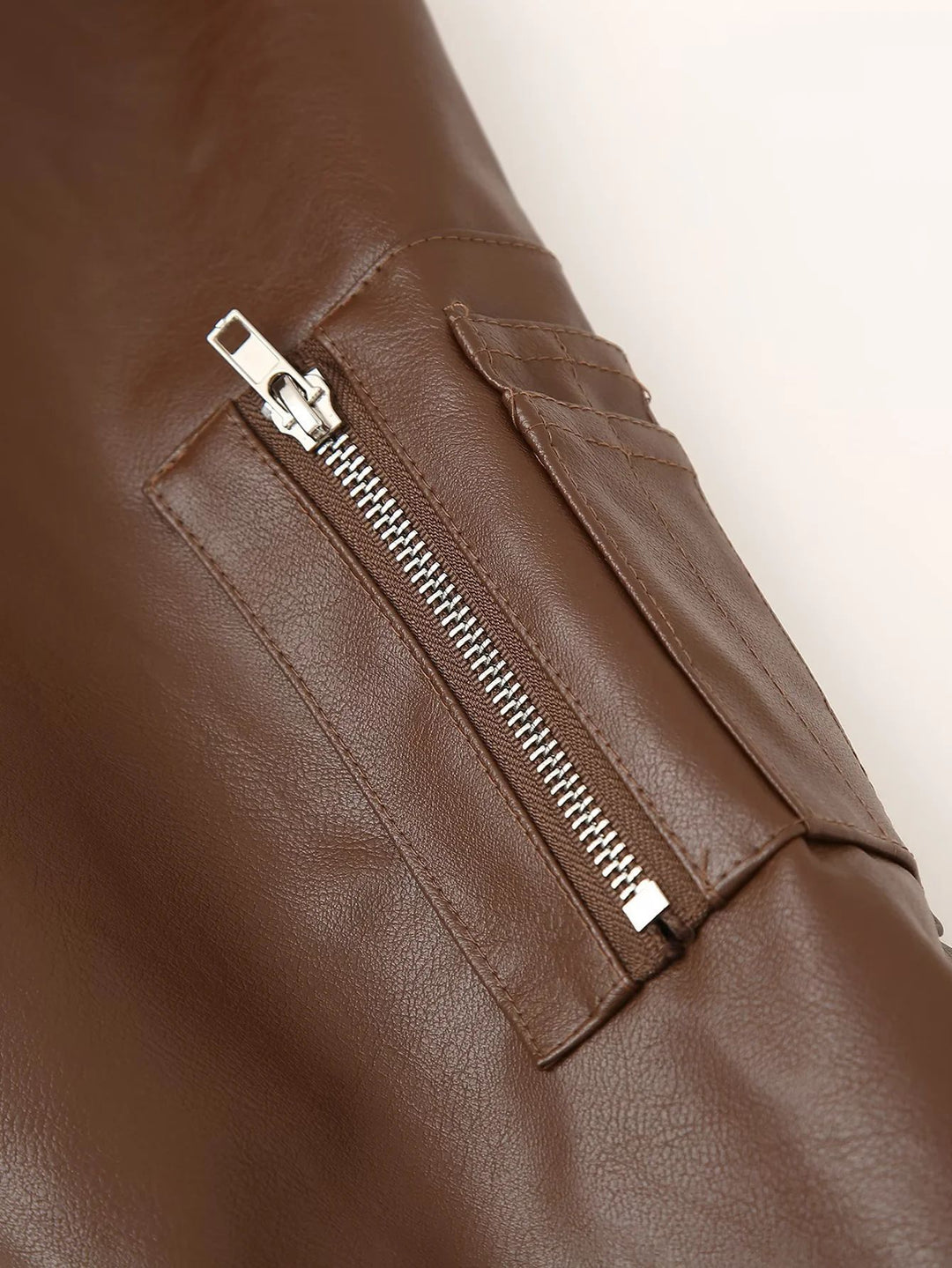 Women's leather bomber jacket with practical zip pockets and elastic waist Lune London