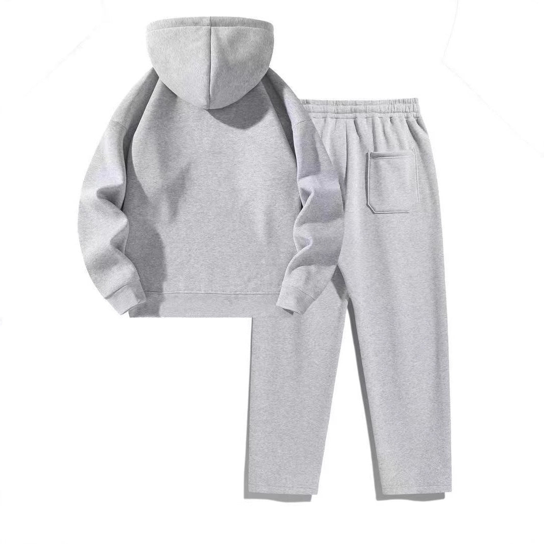 Women's sporty hoodie set with practical zip jacket and comfortable jogging pants Chic & Stil