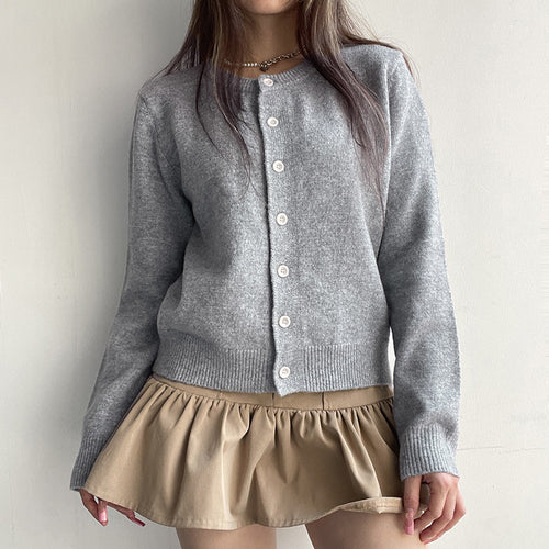 Cardigan pour femmes avec une texture fine et des détails de bouton élégants Chic & Stil