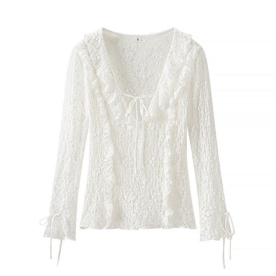 Ladies figure-hugging lace blouse with ruffle V-neck and tie detail Amarae