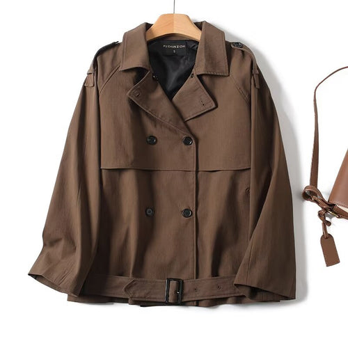 Trendy oversized trench coat for women with double-breasted closure and tie belt Amarae