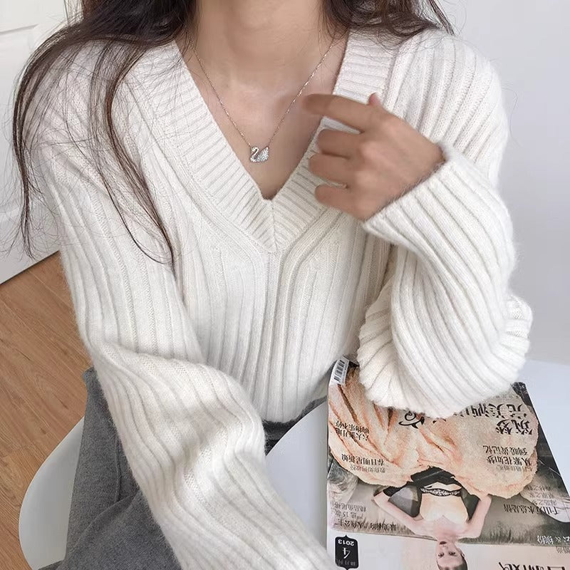Pull femme en maille fine avec décolleté en V et coupe décontractée Chic & Stil