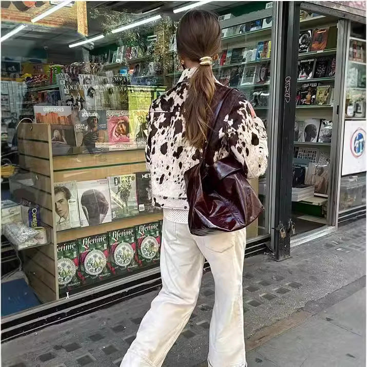 Ladies short-cut western trucker jacket with cow spot look and applied chest pockets Amarae