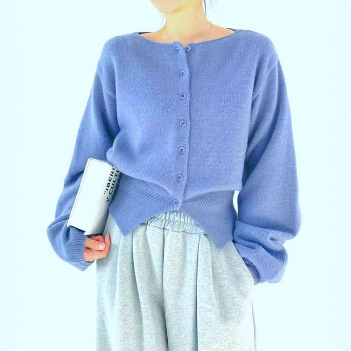 Pull cropped femme avec des détails de boutons et des manches surdimensionnées Chic & Stil