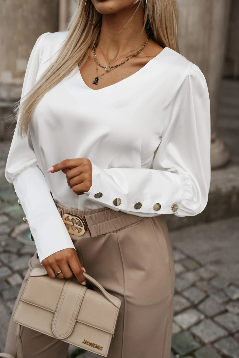 Ladies' blouse with trendy puff sleeves and decorative button details Lune London