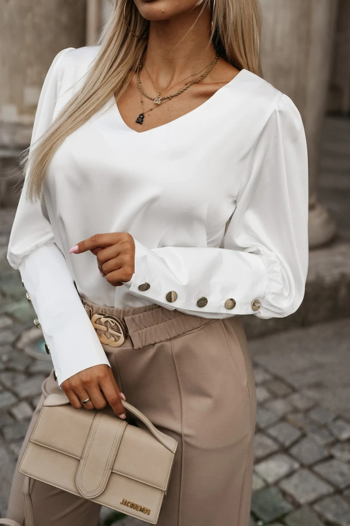 Ladies' blouse with trendy puff sleeves and decorative button details Lune London