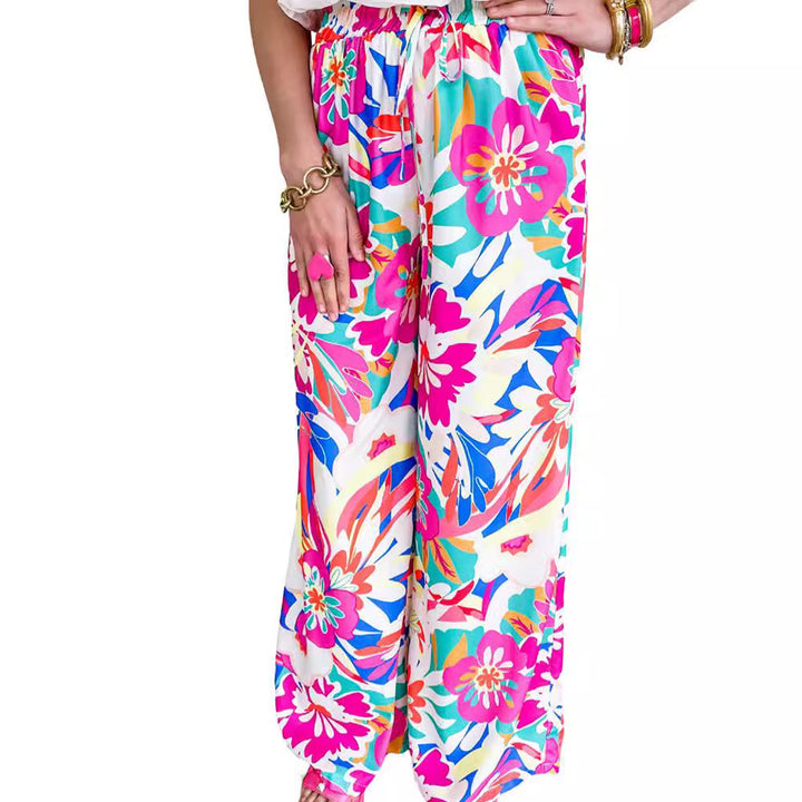 Leisure pants for women, wide, with a colorful floral pattern and an elastic waistband Lune London