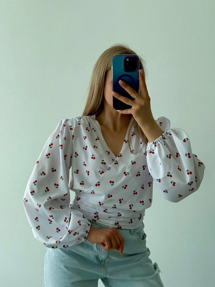 Women's wrap blouse with cherry print, wide puff sleeves & tie belt Amarae