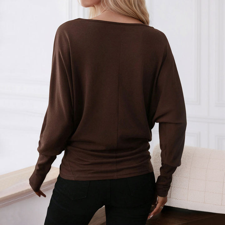 Chemise féminine surdimensionnée à manches longues avec un élégant col rond et un design décontracté Chic & Stil