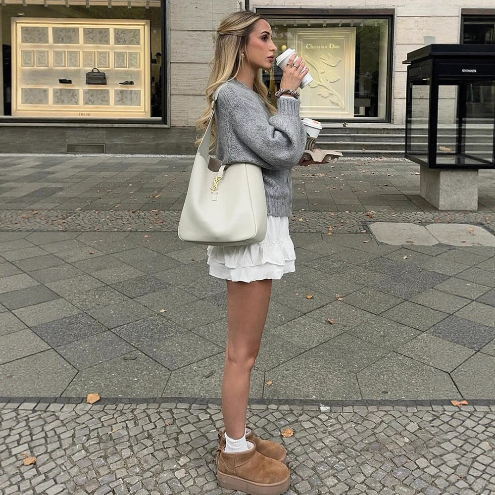 Women's cropped chunky knit cardigan with oversized balloon sleeves and visible button placket Amarae